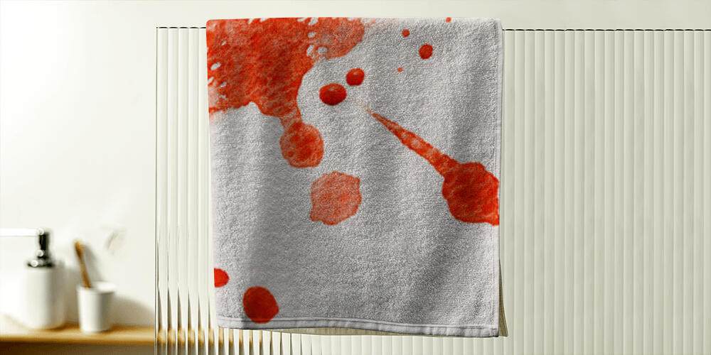 close up view of yellow and red watercolor paint brushstrokes with drops on white textured background, 