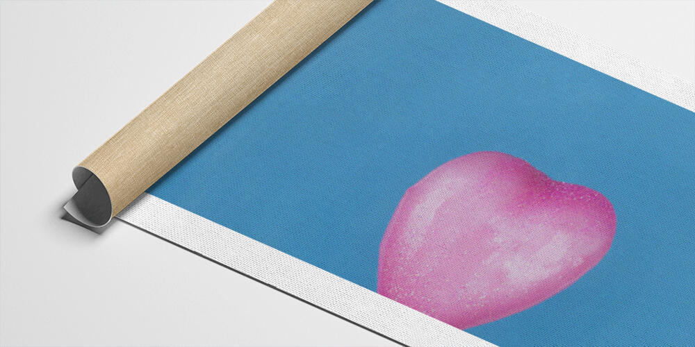 Heart dipped in pink paint on blue textured background, 