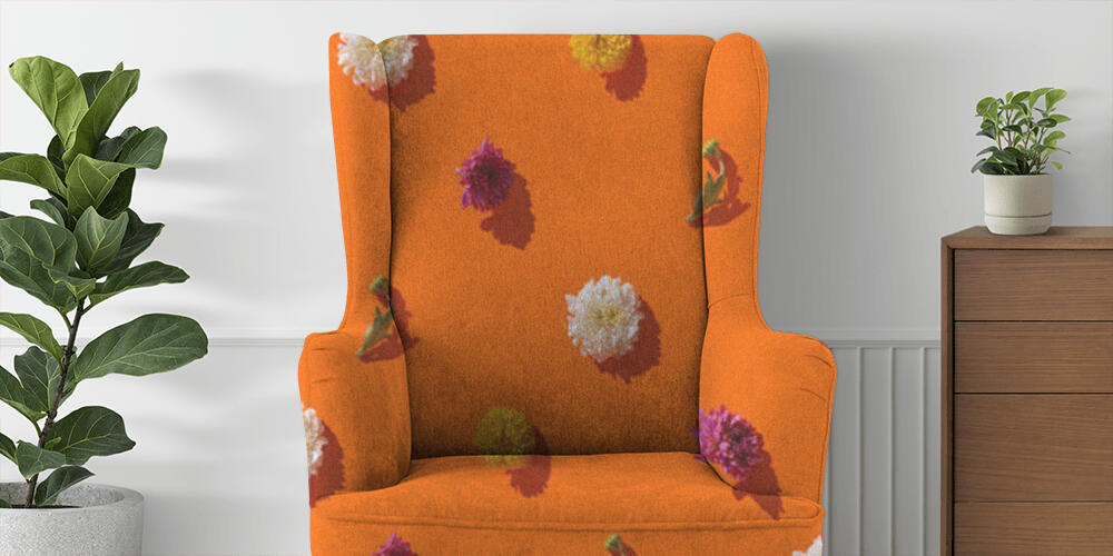 Creative pattern made of chrysanthemum flowers on bright orange background, 