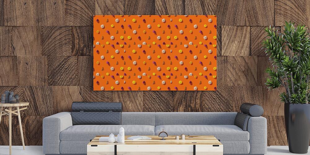 Creative pattern made of chrysanthemum flowers on bright orange background, 
