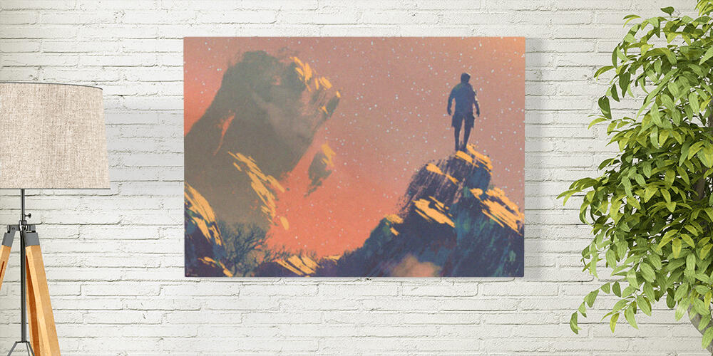 Man standing on top of the hill watching the stars, 