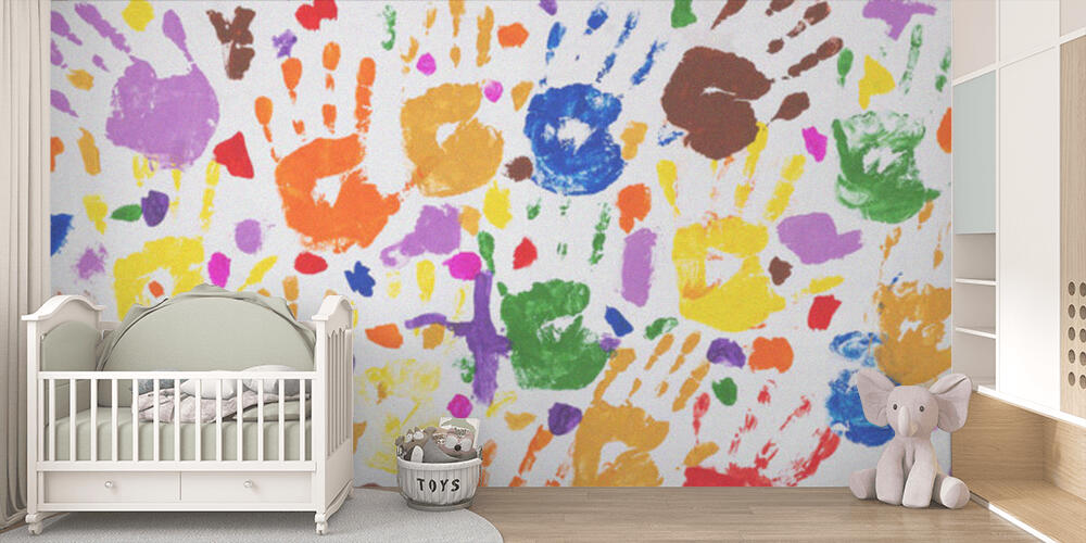 Colored prints of childrens hands on a white canvas, Bambini