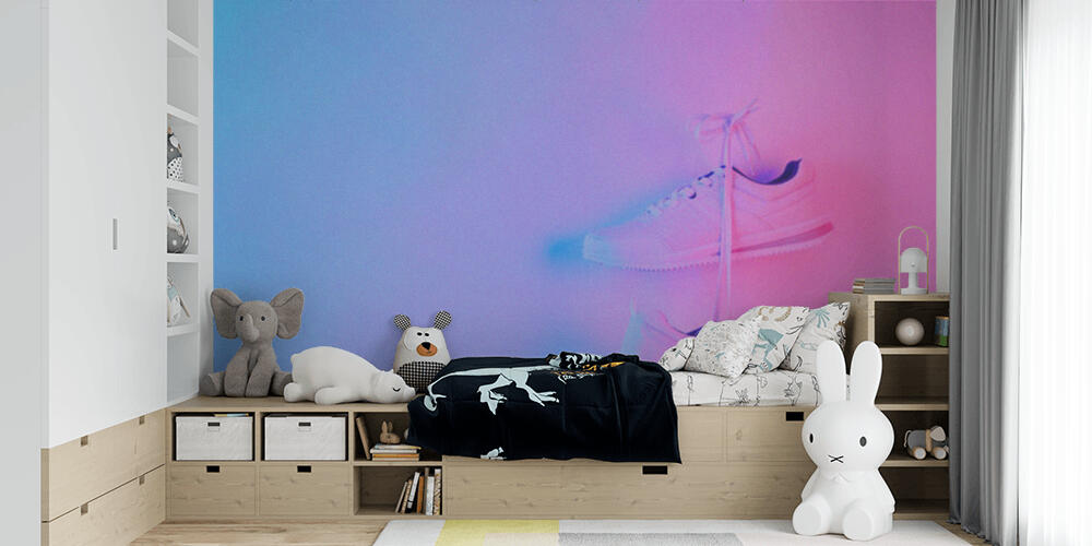 Pair of stylish sneakers hanging on wall, Bambini