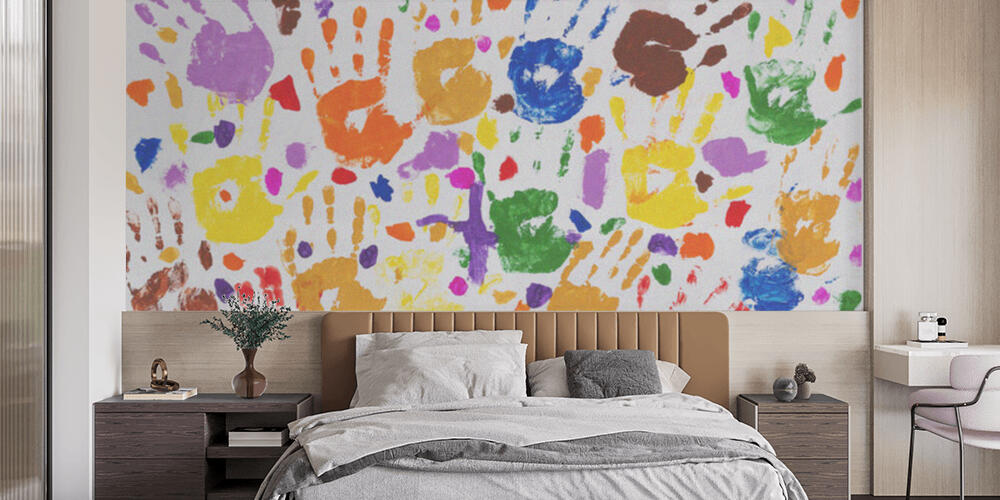 Colored prints of childrens hands on a white canvas, Camera da Letto