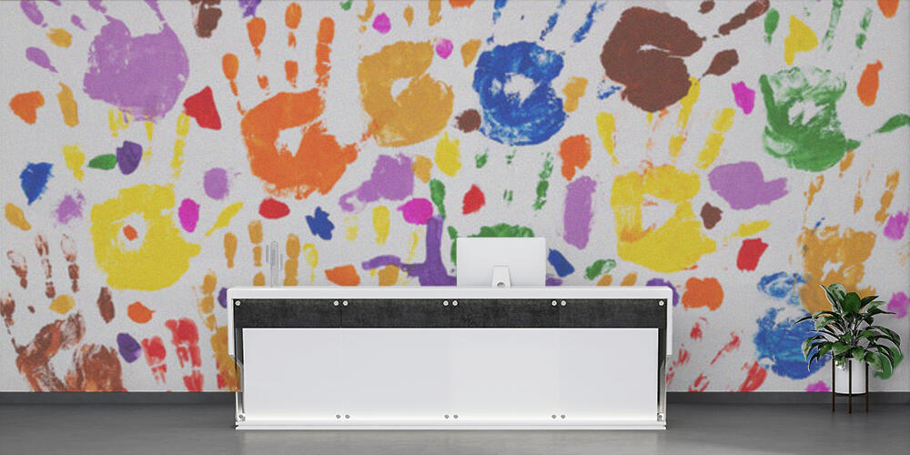 Colored prints of childrens hands on a white canvas, Reception