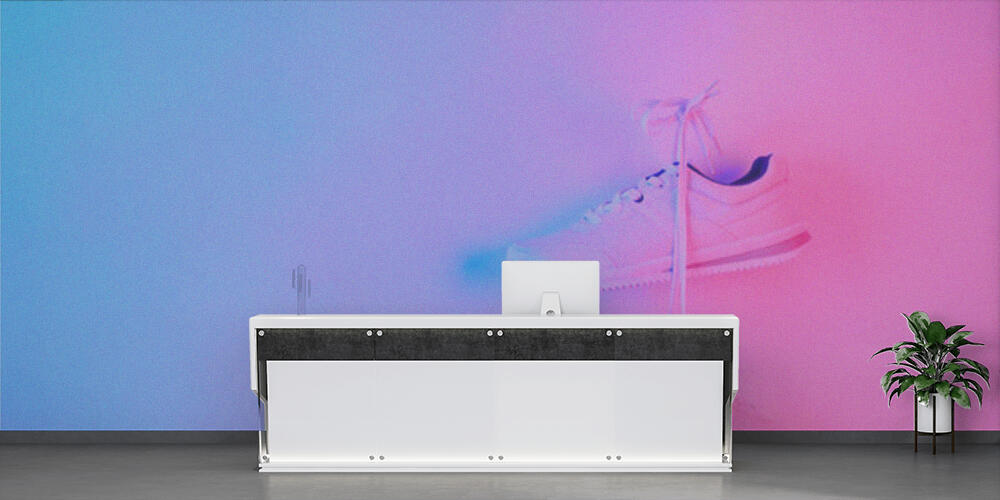 Pair of stylish sneakers hanging on wall, Reception