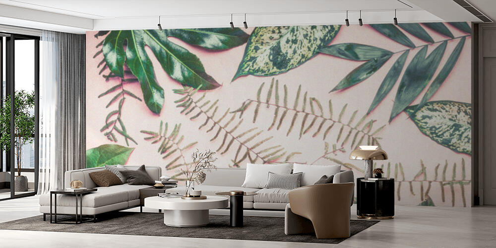 Creative layout made of various tropical palm and fern leaves on pastel pink background, Salotto